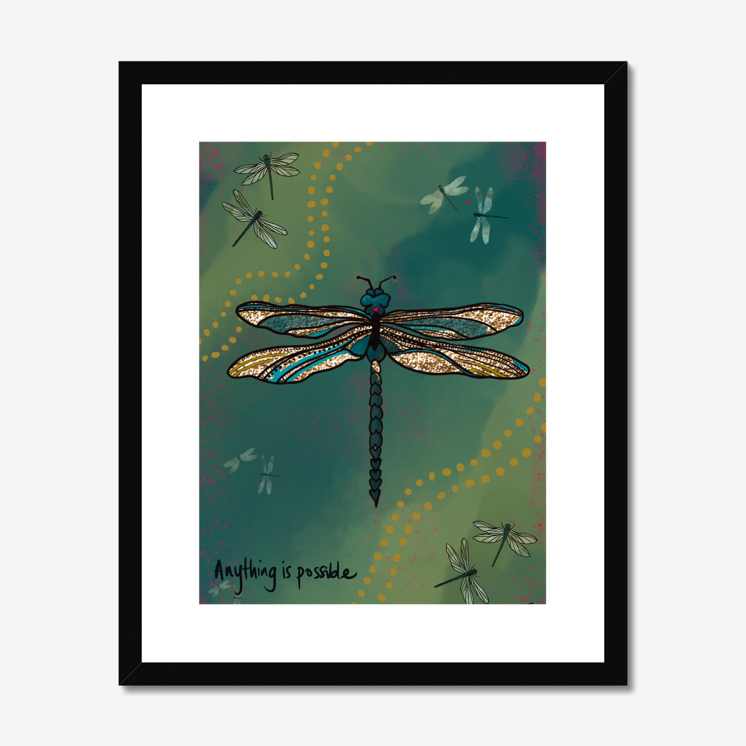 Framed artwork of a dragonfly with 'Anything is possible' text on a teal background
