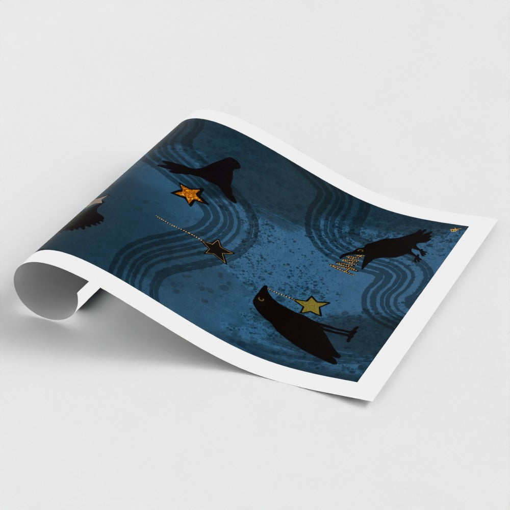 Folded paper with whale illustrations on a blue background